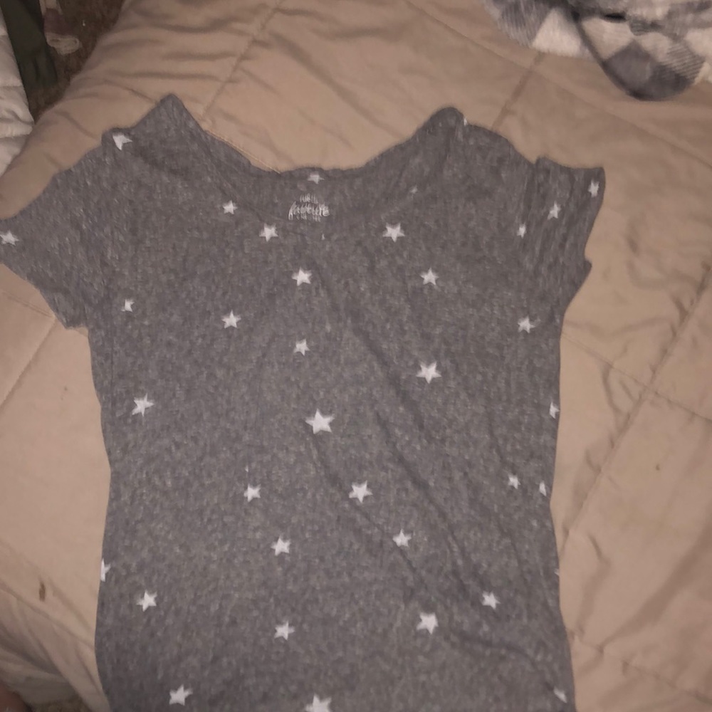 grey t-shirt with white stars, v neck